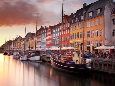 Colorful houses line Nyhavn canal in Copenhagen, Denmark (© Benjeev Rendhava/Getty Images)