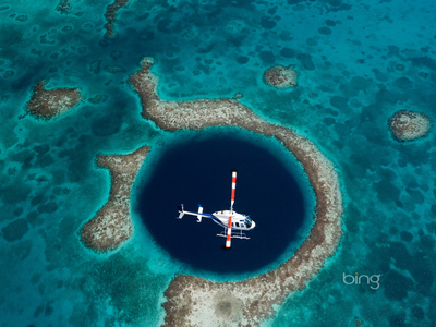 Great Blue Hole underwater sinkhole off the coast of Belize (© Image Source/Corbis)