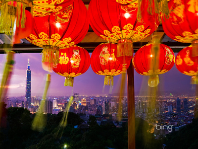 Taipei 101 tower seen in the distance from a temple festooned with paper lanterns in Taipei, Taiwan (© Marc Dozier/Hemis/Corbis)