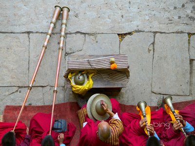Musicians at a dance performance at the Thangbi Mani Festival in Bhutan (© Keren Su/Getty Images)